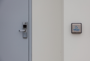 handicap door opener outside a locked door